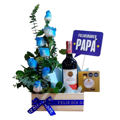 Arreglo en rosas  azules con botella de vino  y chocolates