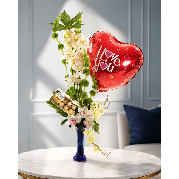 Orquídeas con Chocolates y Globo en Florero de Vidrio - Edición Valentín